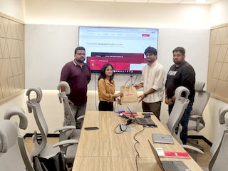 upGrad Guwahati office - student and parents with the counselling team after their study abroad session